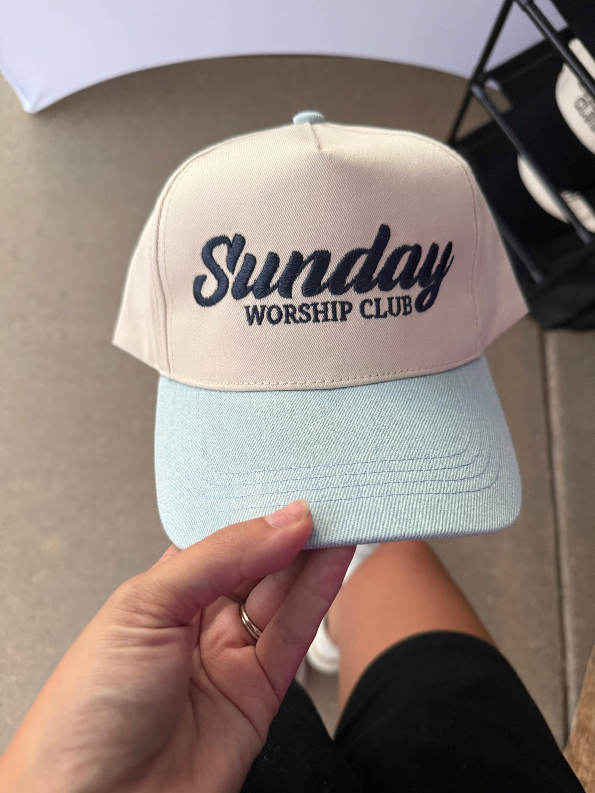a person holding a hat