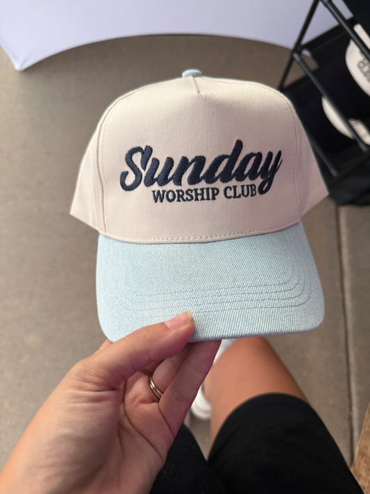 a person holding a hat